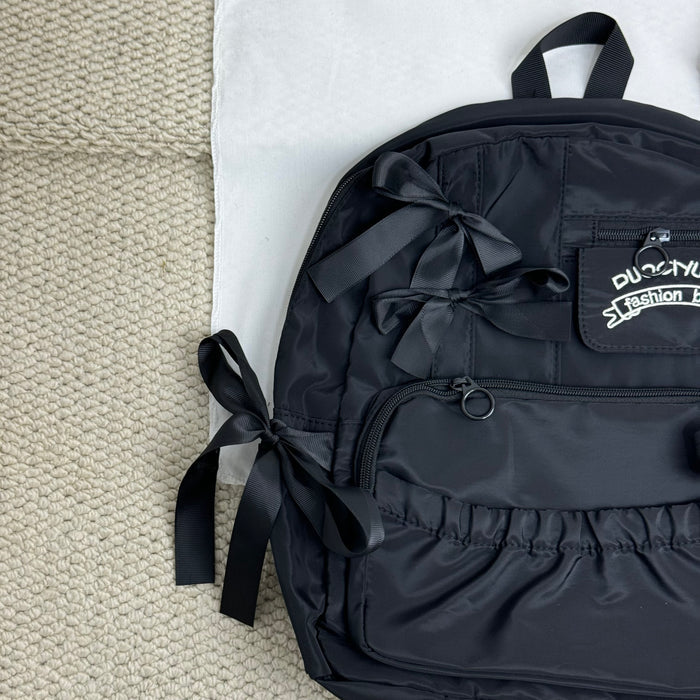 Compact pleated backpack
