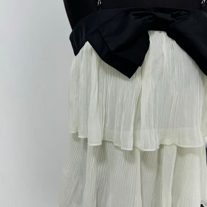 Contrasting-color bow tie backless halter dress