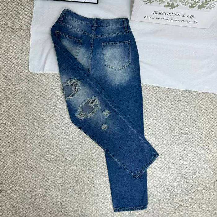 High-Waisted Ripped Jeans