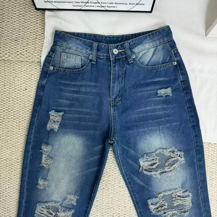 High-Waisted Ripped Jeans