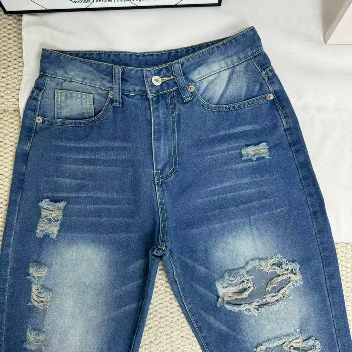 High-Waisted Ripped Jeans
