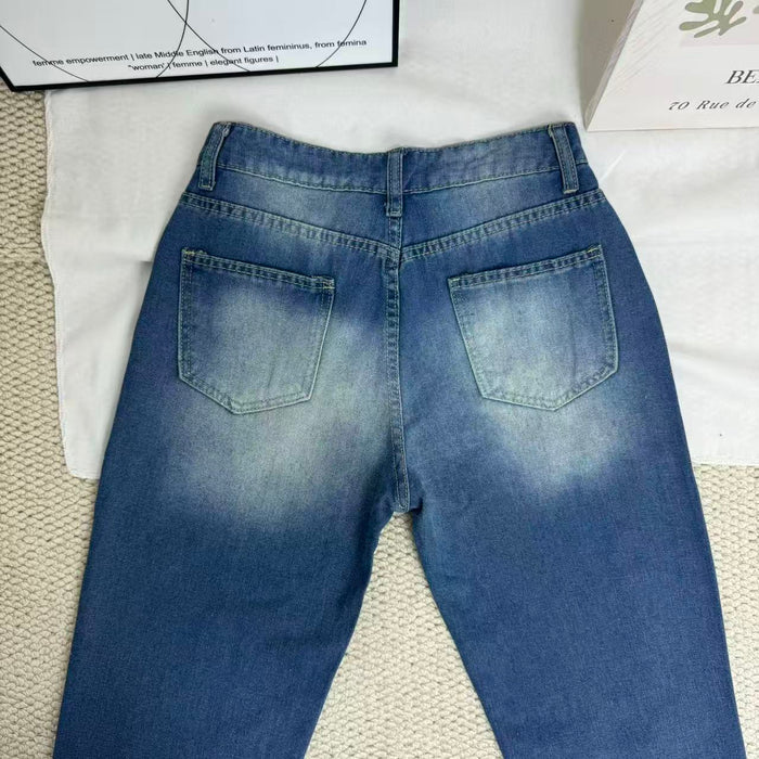 High-Waisted Ripped Jeans