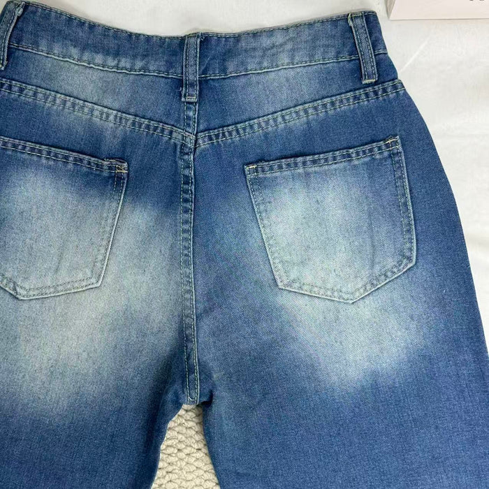 High-Waisted Ripped Jeans